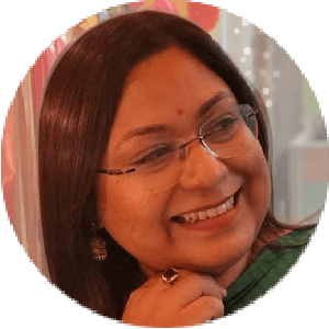 Smiling woman with spectacles enjoying the live online event