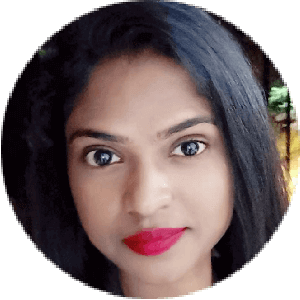 Woman with black hair and red lipstick in the audience