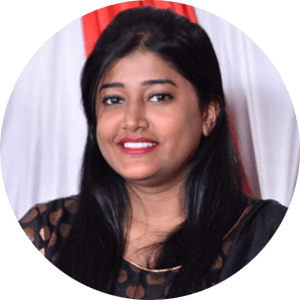 Well-groomed woman in the audience watching the virtual event