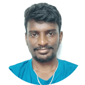 Smiling man in blue tees in the audience